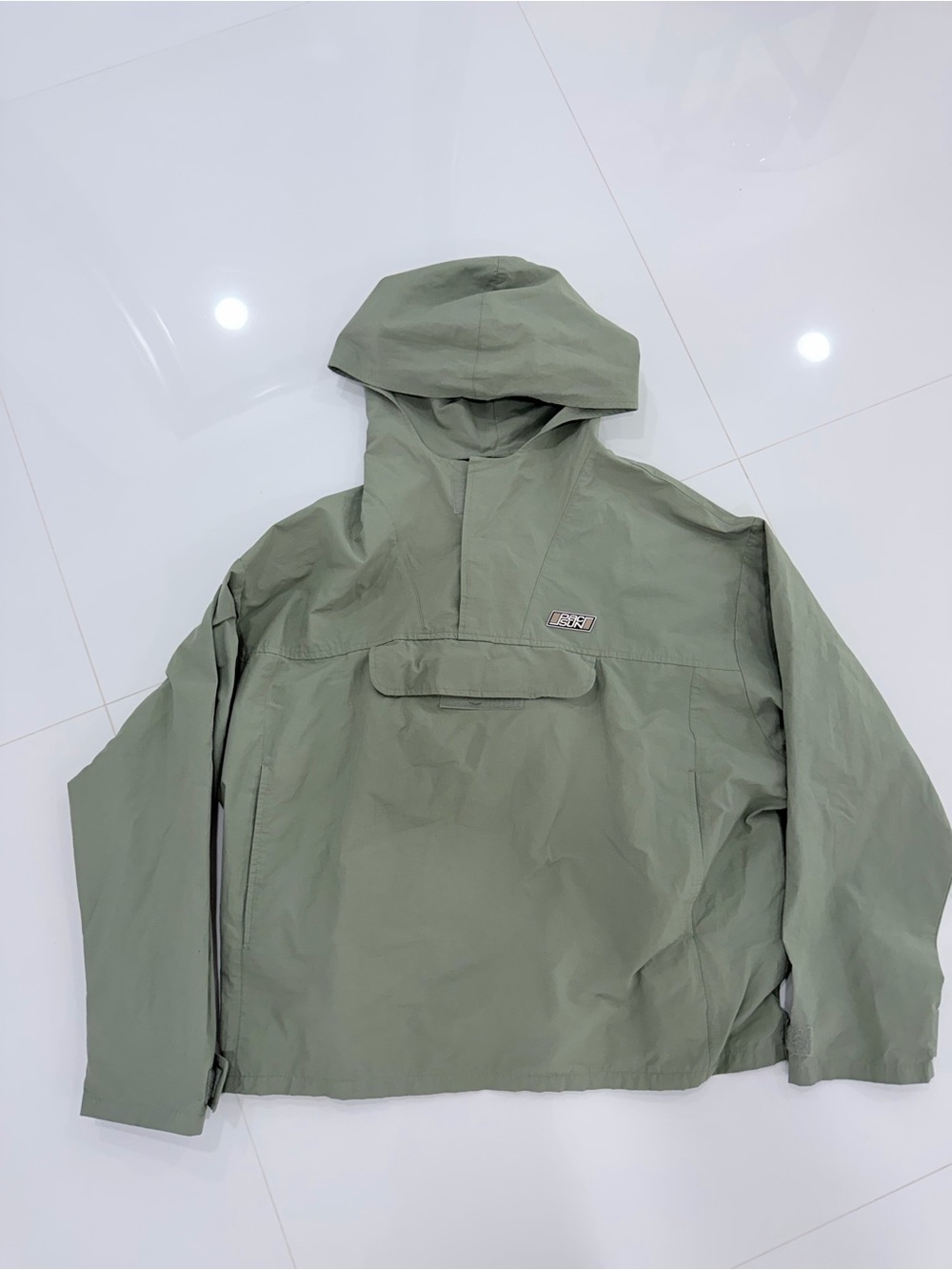 Vintage-style olive green Pacsun pullover windbreaker